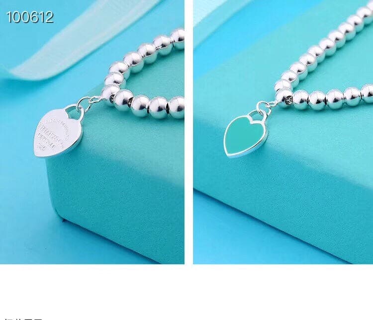 18K Celestial Return to T Heart Earrings