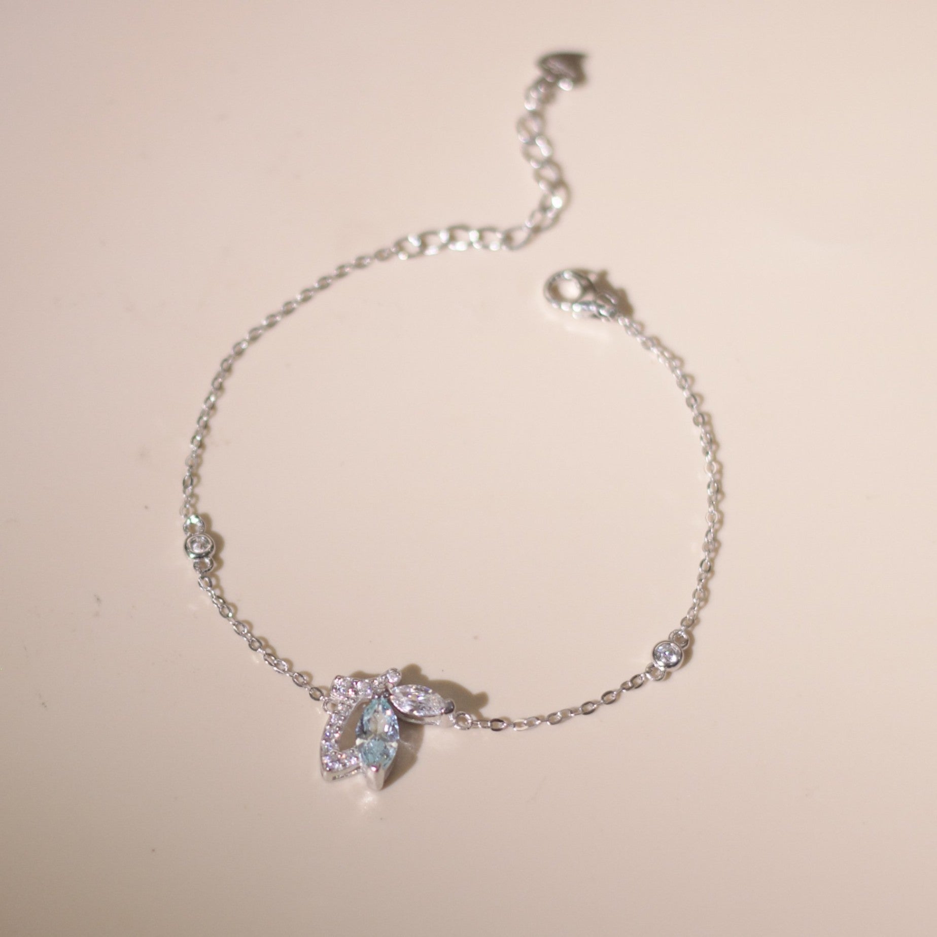 ELVORIA Emmi Butterfly Bracelet with Blue Stone – Platinum Plated 925 Sterling Silver