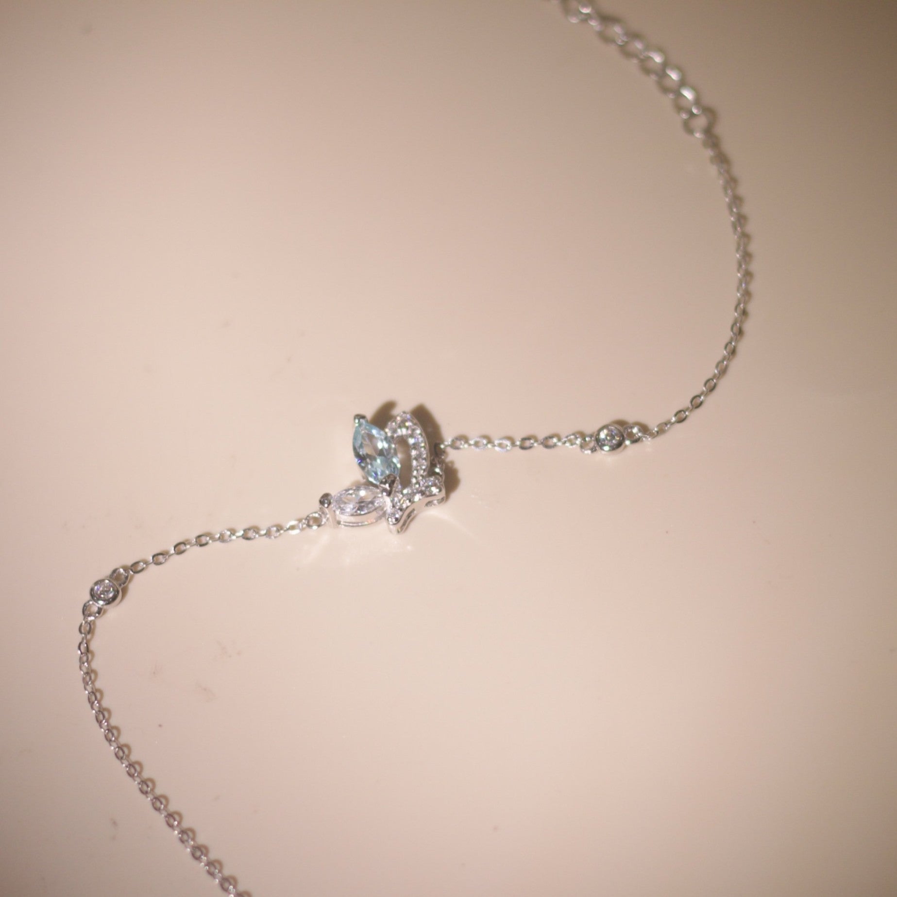 ELVORIA Emmi Butterfly Bracelet with Blue Stone – Platinum Plated 925 Sterling Silver