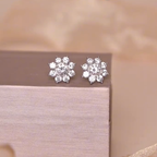 ELVORIA Shella Eight-Petal Flower Moissanite Earrings in 925 Sterling Silver – Platinum Finish