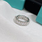 18K Celestial T Schlumberger Eighteen Stone Ring